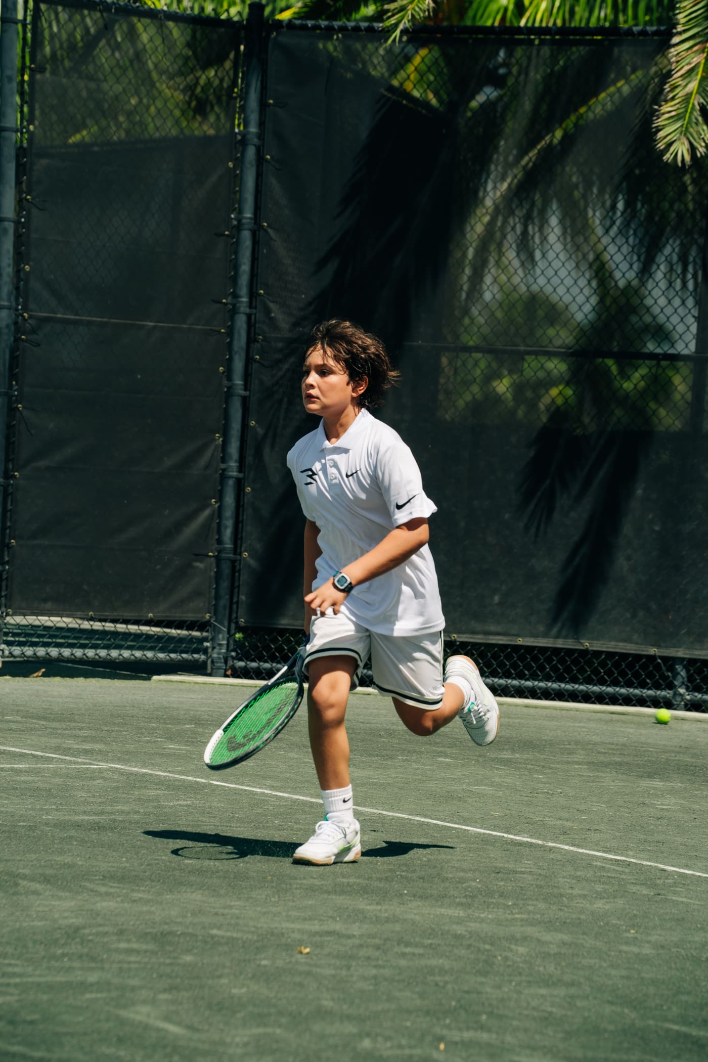 Junior moving across the court